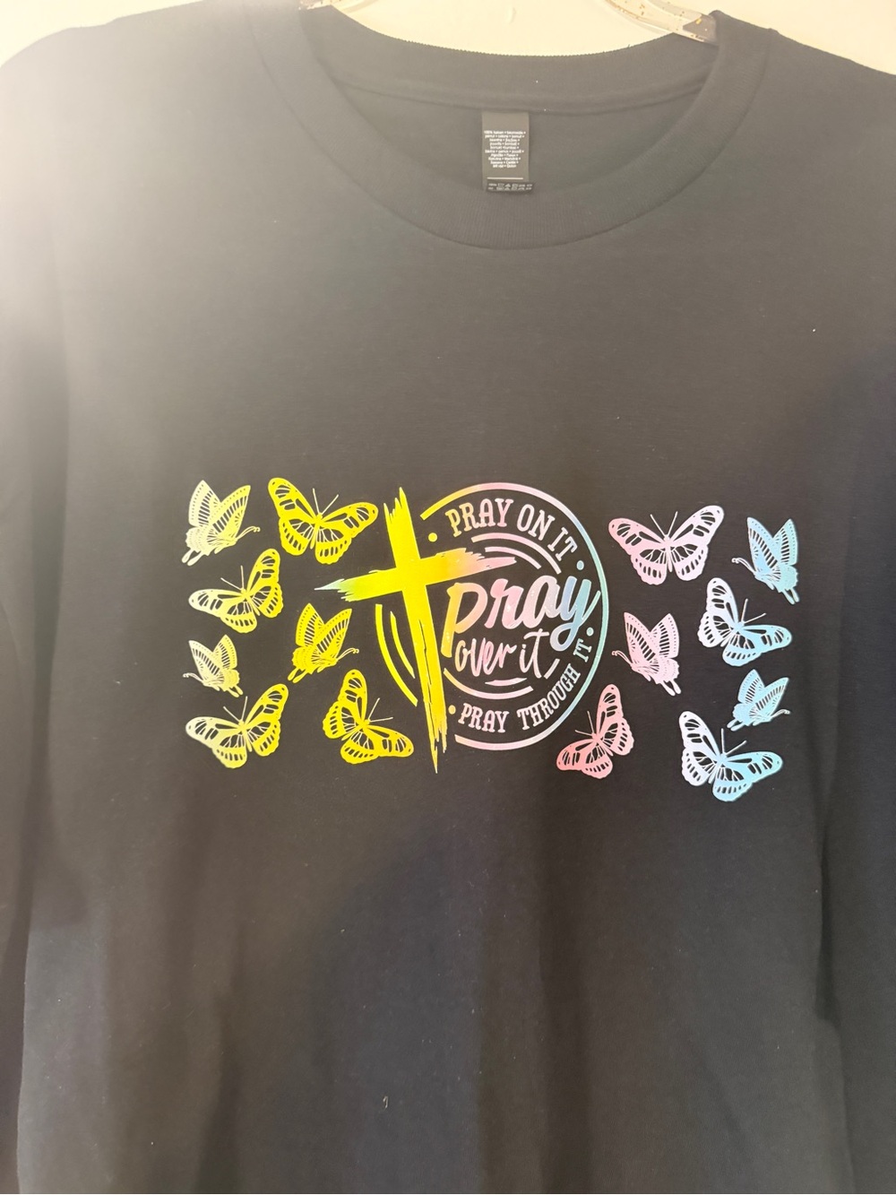 H&M Black Short Sleeve Tee with Pastel Butterfly Cross Graphic - Picture 2 of 4